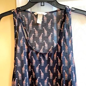 H & M sleeveless tank top with giraffe 🦒 print. Gently used